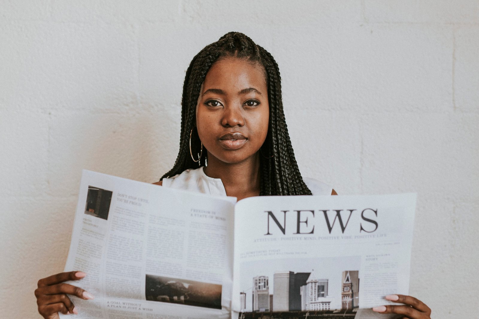 black woman reading magazine | Post Your Story